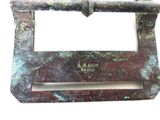 a picture of a metal belt buckle on a white background