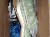 a cardboard box filled with a lot of items