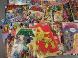 a lot of comic books that are on the table