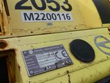 a close up of a yellow machine with a number on it