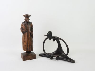 two figurines of a man and a woman on a white background
