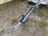 a trailer that has a tow bar attached to it