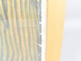 painting of a zebra in a wood frame on a white background