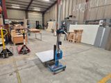 a machine that is sitting in the middle of a warehouse