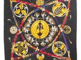 black silk scarf with gold medallions and flowers on a black background