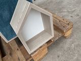 several pieces of wood are stacked on top of a pallet
