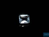 a square cut diamond on a black background