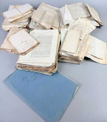 a pile of old books sitting on a table