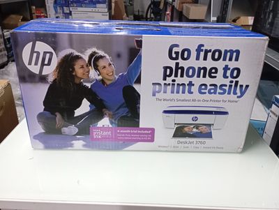 a blue box with a picture of two women sitting on it