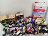 a lot of socks and socks in boxes on the floor