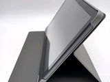 a tablet that is sitting on top of a stand