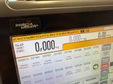 a picture of a pay machine with a lot of cash on it