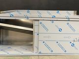 a box that has a door open on the floor