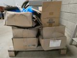 a pile of boxes sitting on a pallet in a warehouse