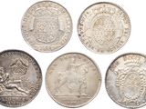 six different british silver coins on a white background