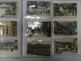 many old photographs of a town on the wall