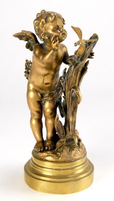 an image of a statue of a cupid holding a branch of a tree