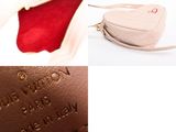 a picture of a purse and a handbag on a table