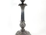 an image of a silver candle holder on a white background
