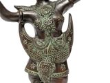 an image of a bronze statue of a woman holding a bowl