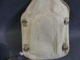 a white canvas bag with a zipper on it