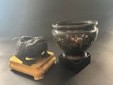 pair of chinese black lacquered bowls and a dragon figurine
