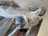 a close up of a motorcycle with a bunch of tools in it