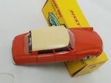 a toy car that is sitting on top of a box