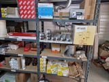 many boxes and boxes on the shelves in the garage