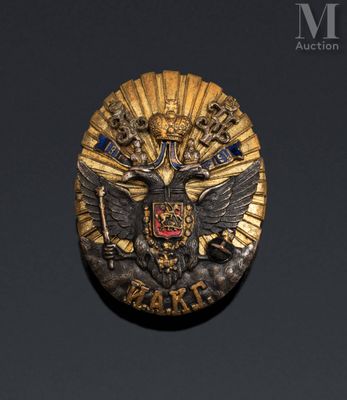 an image of a gold medal with a black eagle on it