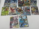 a lot of pokemon cards in a box on the table