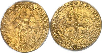 a gold coin with a woman holding a cross on it