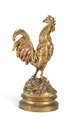 coq en laiton sur socle, sur fond blanc, avec un fond blanc