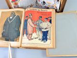 three books that are sitting on a table