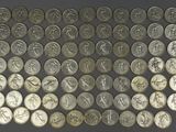 an image of a pile of silver coins sitting on top of a table