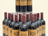 bottles of wine are stacked on top of each other in a pyramid