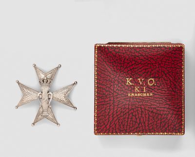an image of a red case with a silver cross on it