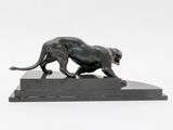 statue of a panther on a marble base on a white background