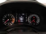 a close up of a car dashboard with a speedometer and gauges