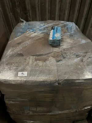 a pile of boxes that have been wrapped up and ready to be shipped
