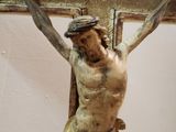 a statue of jesus on the cross with a cross on it