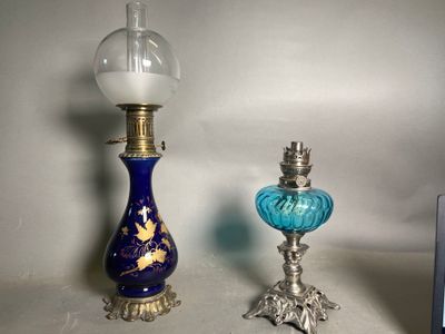 two vases that are next to each other on a table