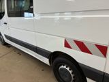 a white van that is parked in a garage