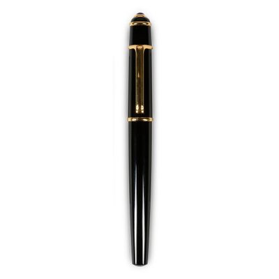 a close up of a pen on a white surface with a white background