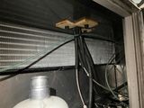 a gas can sitting in the corner of a room