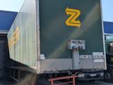 a truck that is parked in front of a building