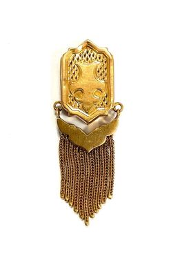 a picture of a gold necklace with a cat on it