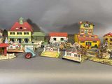 tout un tas de bâtiments miniatures posés sur une table
