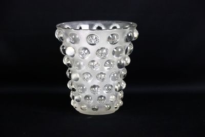 a clear glass vase with a lot of bubbles on it