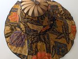 a picture of a hat with a umbrella on top of it